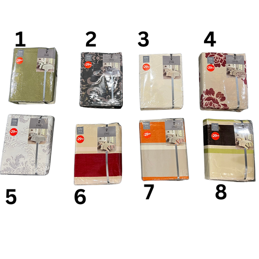 Eight packages of fabric with different patterns and colors on a white background