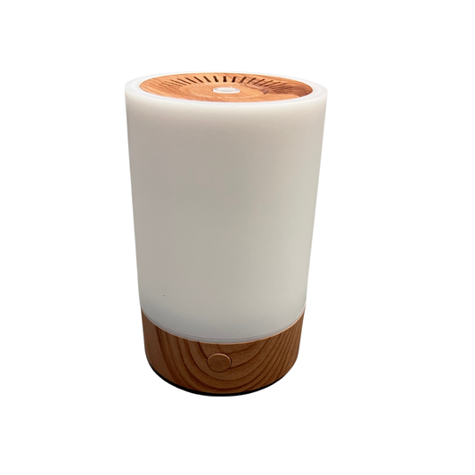 White and wooden diffuser on a white background