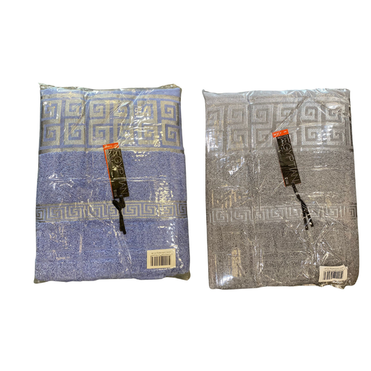 Two folded towels with a geometric pattern in packaging on a white background