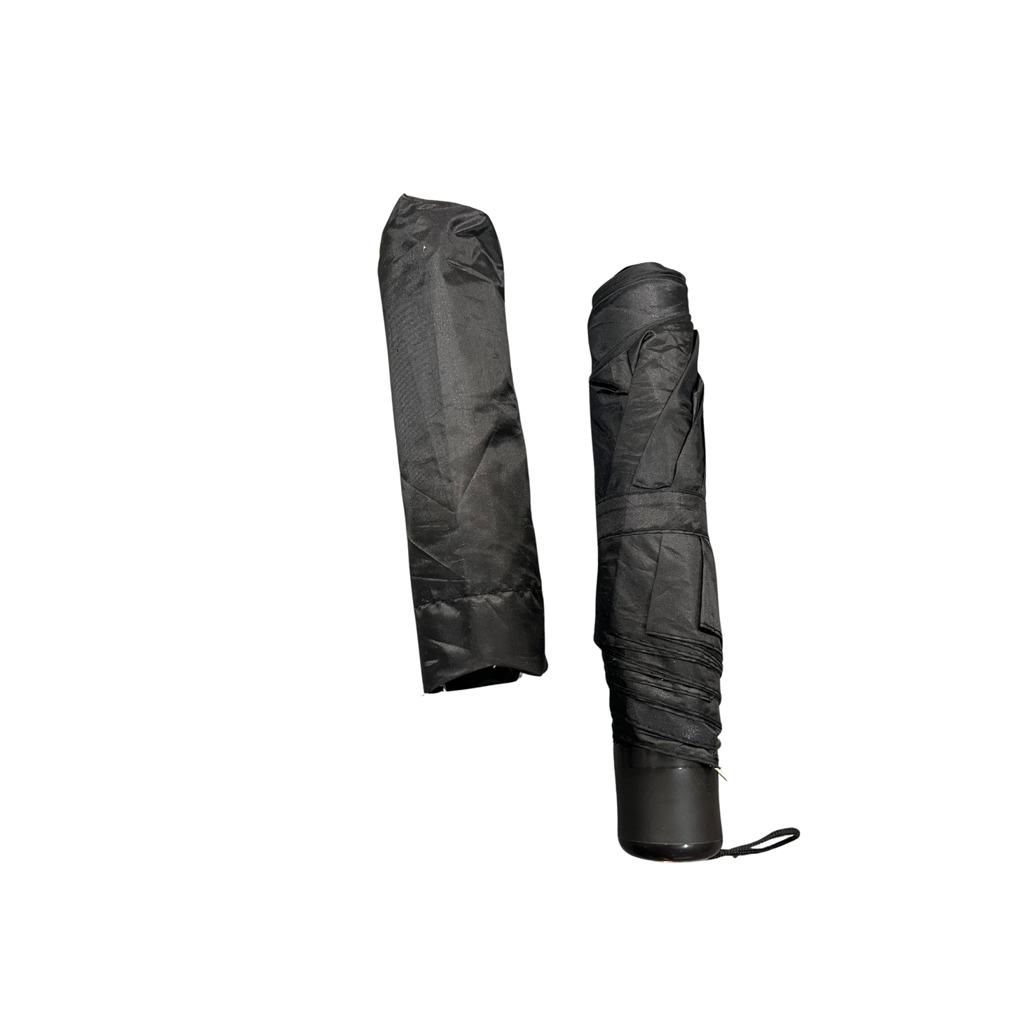Black umbrella and its folded cover on a white background
