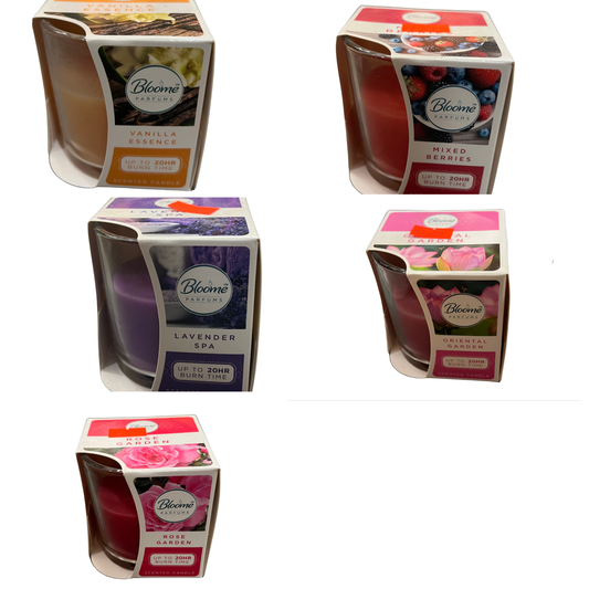 Five Bloome Parfums candles in their packaging on a white background