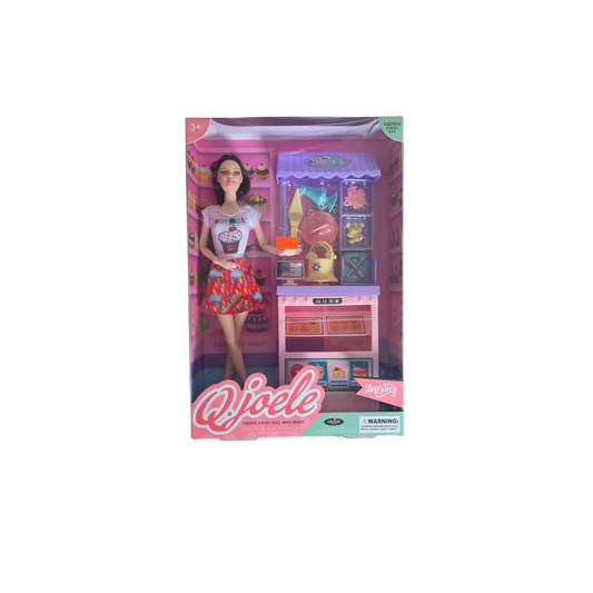 Toy doll packaging with a doll and miniature furniture set on a white background