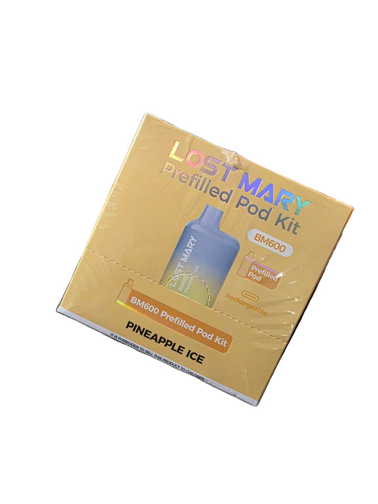 Lost Mary pre-filled pod kit held by a person in an indoor setting with boxes in the background.