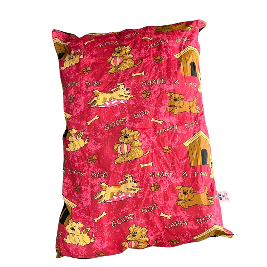 Pink dog bed with cartoon dog design on a white background