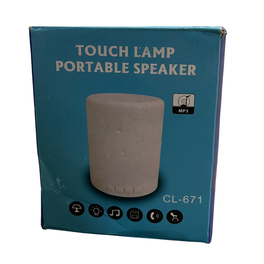 Box of a touch lamp portable speaker with a gray cylindrical device on a blue background.