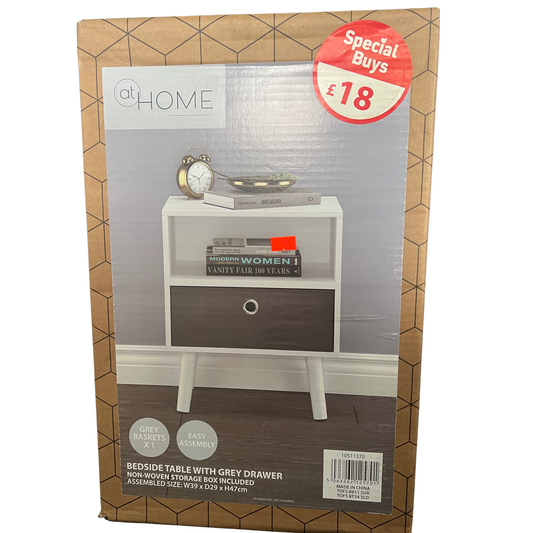 Packaged bedside table with gray drawer on a white background